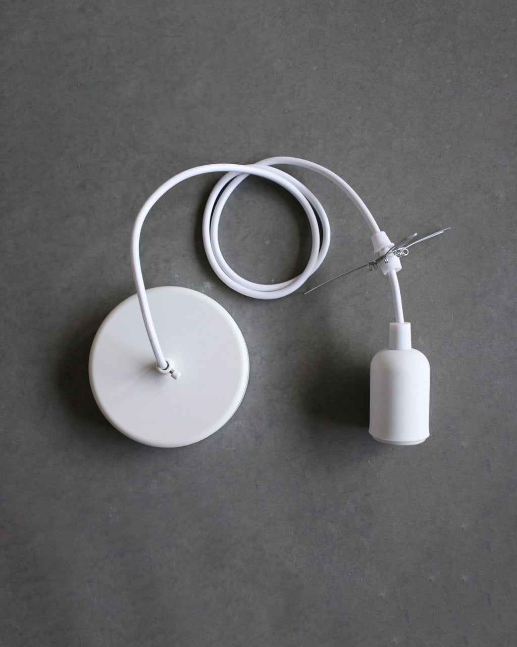 Pendant Lamp set with white canopy, white socket and cord with a lampshade holder on a gray background