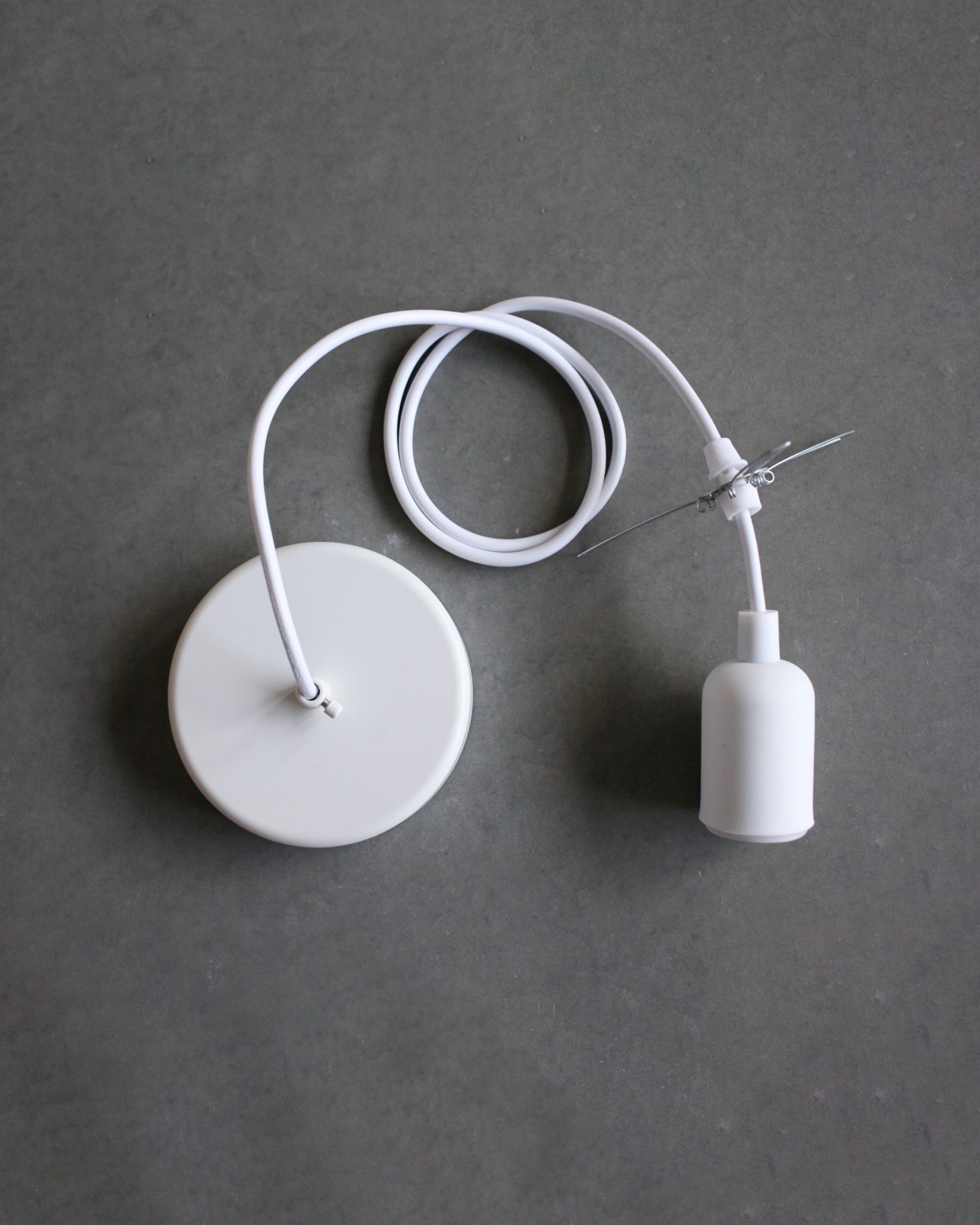 Pendant Lamp set with white canopy, white socket and cord with a lampshade holder on a gray background