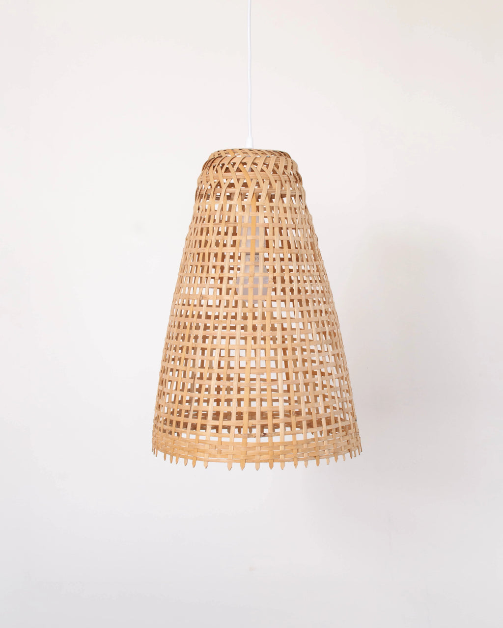 Woven fish-trap bamboo lampshade on a white background