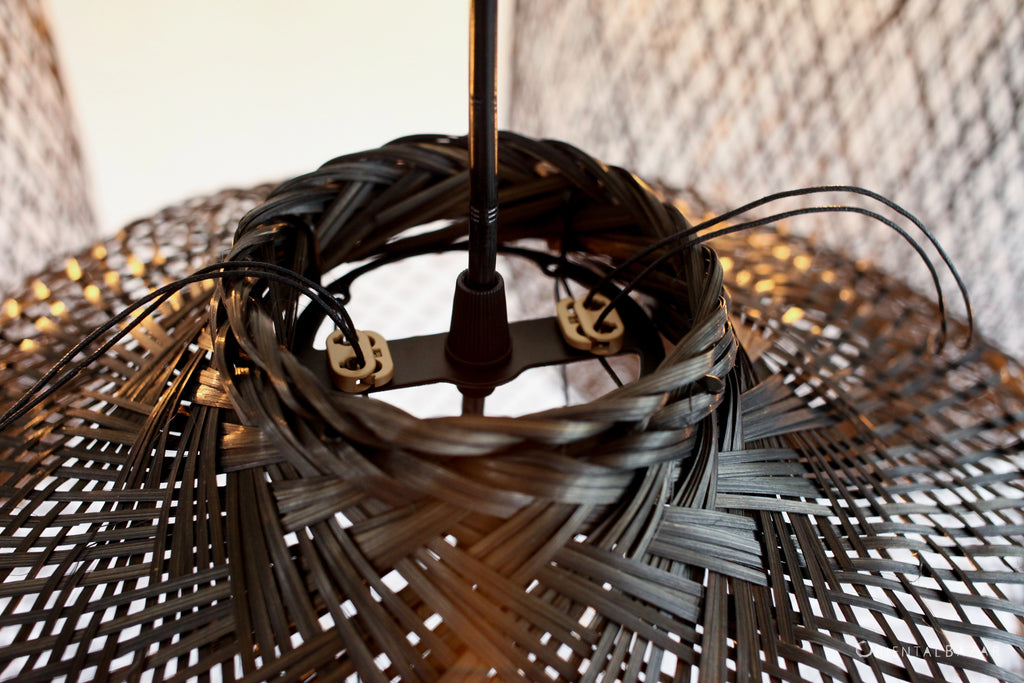 Close-up of a black bamboo lampshade with visible proprietary fitter
