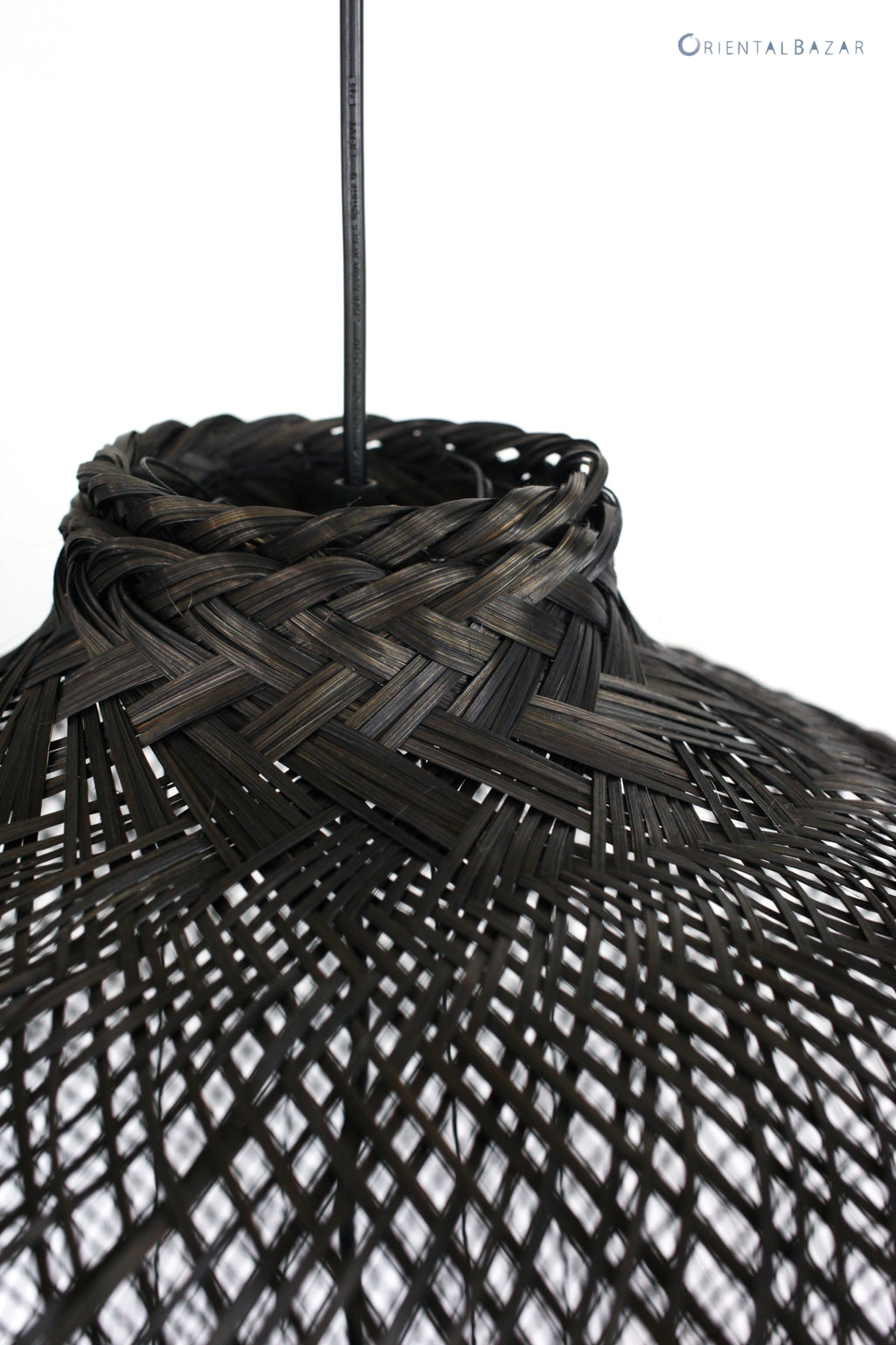 Close-up of top part of a black bamboo pendant light on a white background