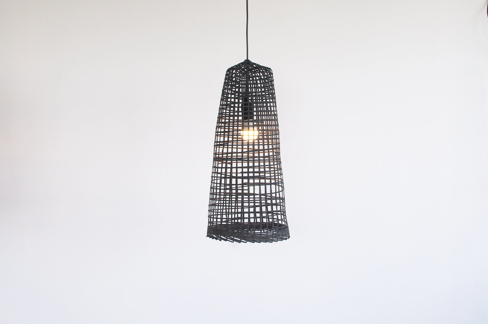 Wabi-Sabi Black bamboo pendant light on a white background