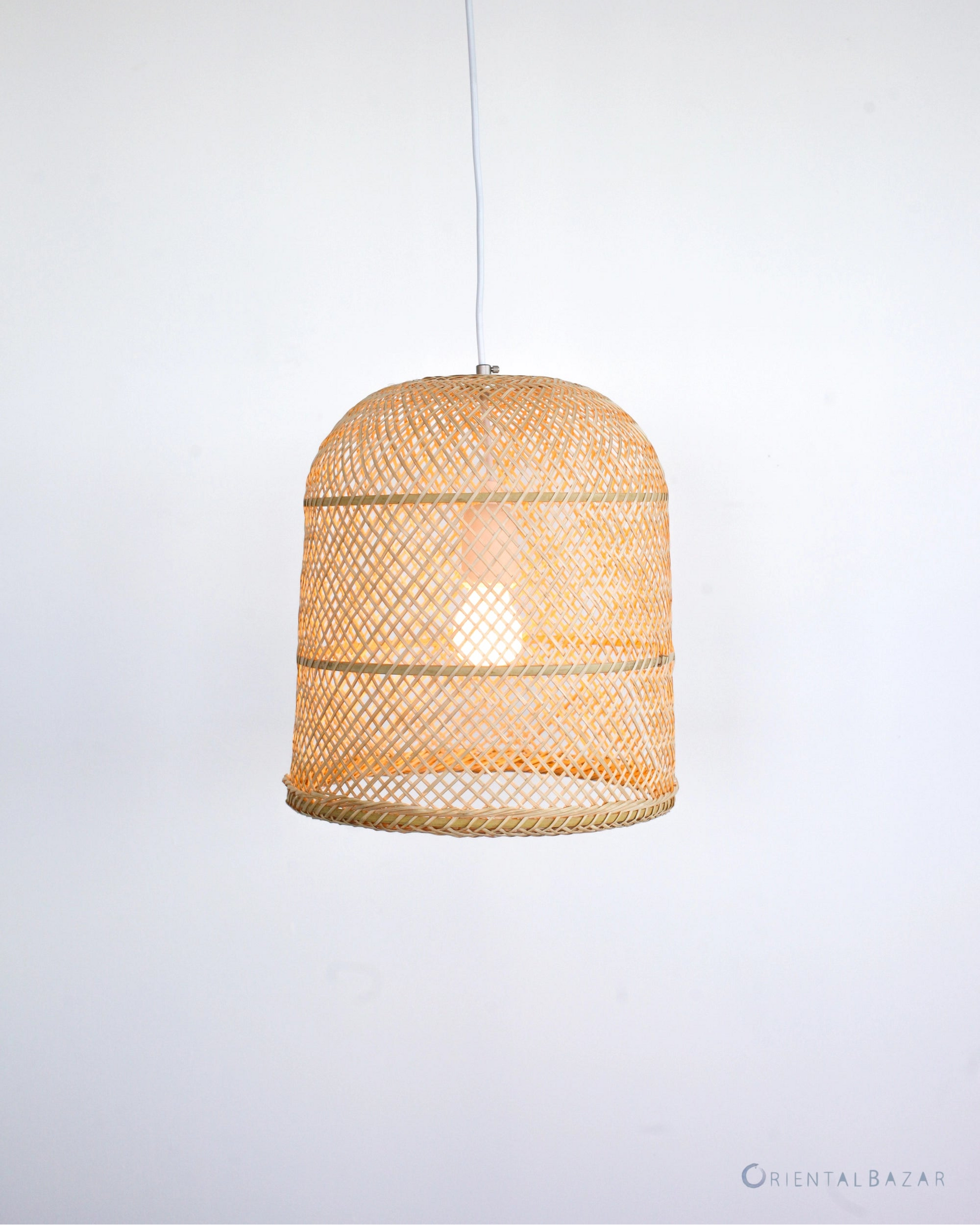 Woven Bamboo rattan pendant light on a white background